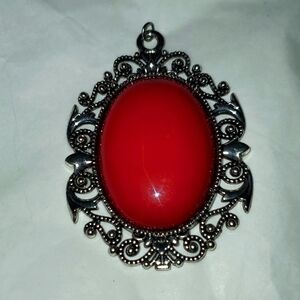 Silver tone large pendant